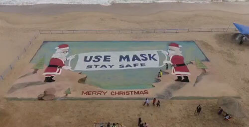 Картина на песке посвящена не только праздникам, но и важности ношения масок