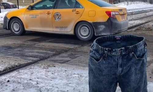Автовладелец замораживает штаны, чтобы зарезервировать парковочное место