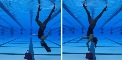 Женщина прошлась модельной походкой под водой вверх ногами