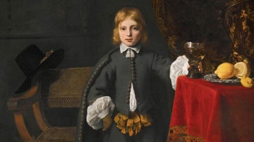 Мальчик на старинном портрете обут в современную обувь