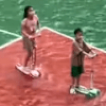 Спортивная площадка превратилась в водную площадку, но детей это не огорчило